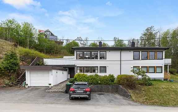 Funkis tomannsbolig i Lillestrøm - stor terrasse og tomt