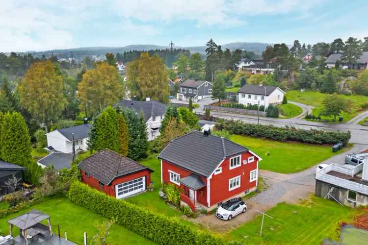 Velholdt tomannsbolig med dobbel garasje